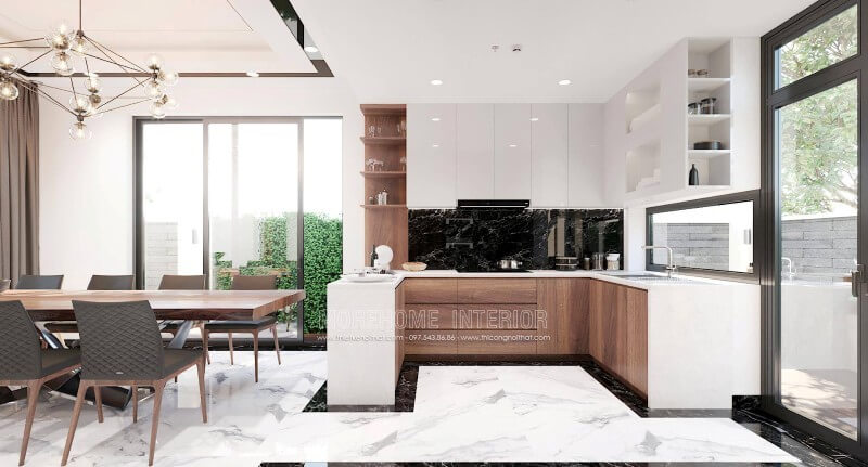 Sự phối hợp hài hòa giữa 2 tone màu chủ đạo trắng và nâu trầm mang đến một không gian nấu nướng tinh tế và không kém phần sang trọng. Thiết kế nội thất phòng bếp gỗ tự nhiên