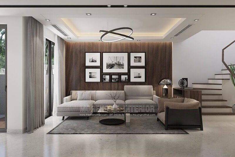 Phòng khách được trang trí hiện đại và đẹp mắt bằng bộ tranh gồm 8 ảnh địa danh nổi tiếng.